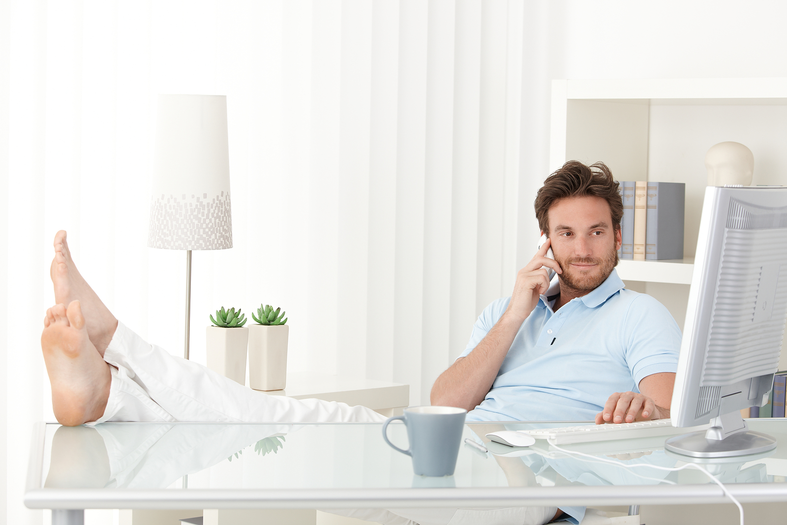 bigstock-cool-man-with-feet-up-on-desk-32312525